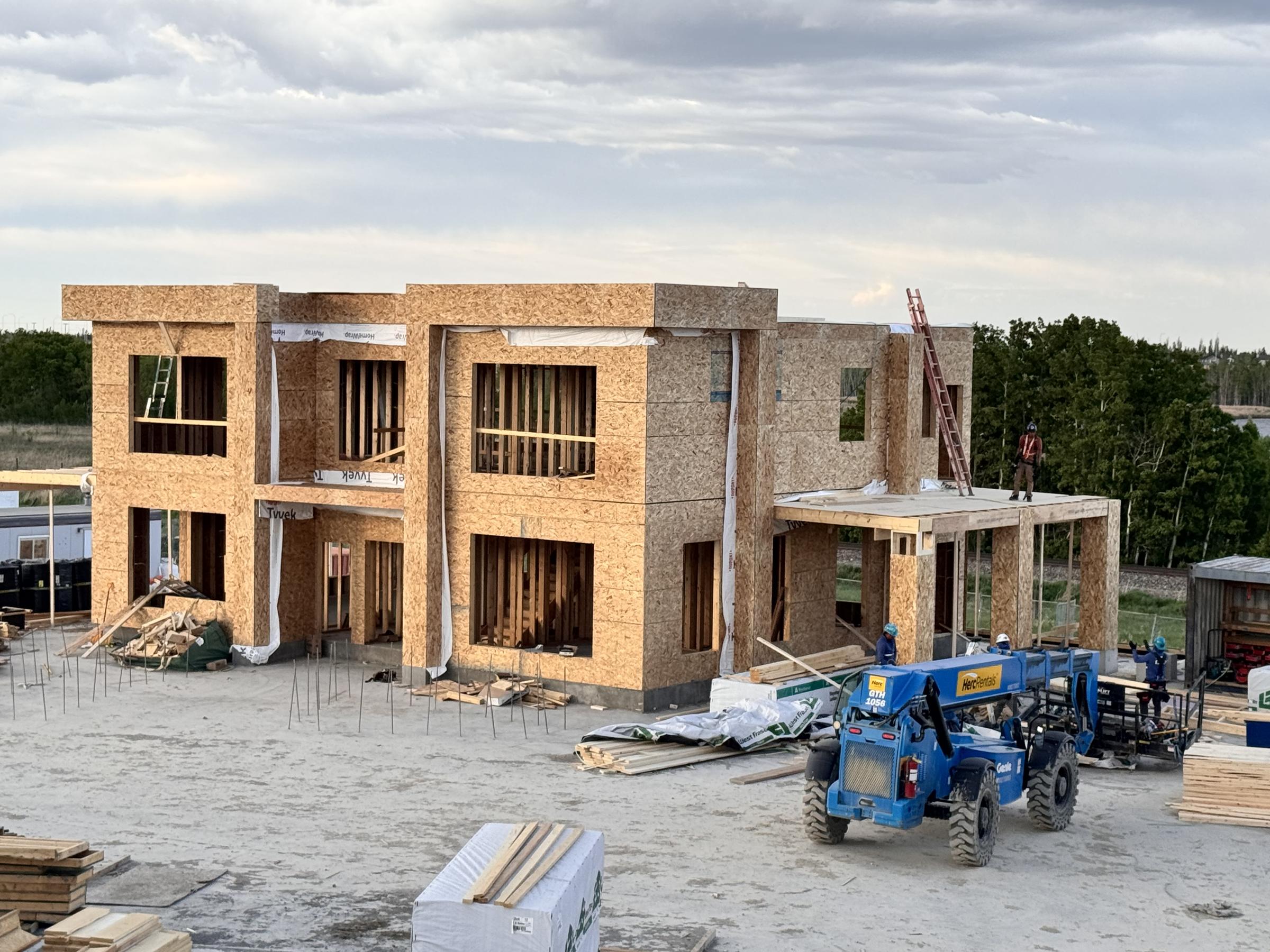 Large custom home framed at dusk