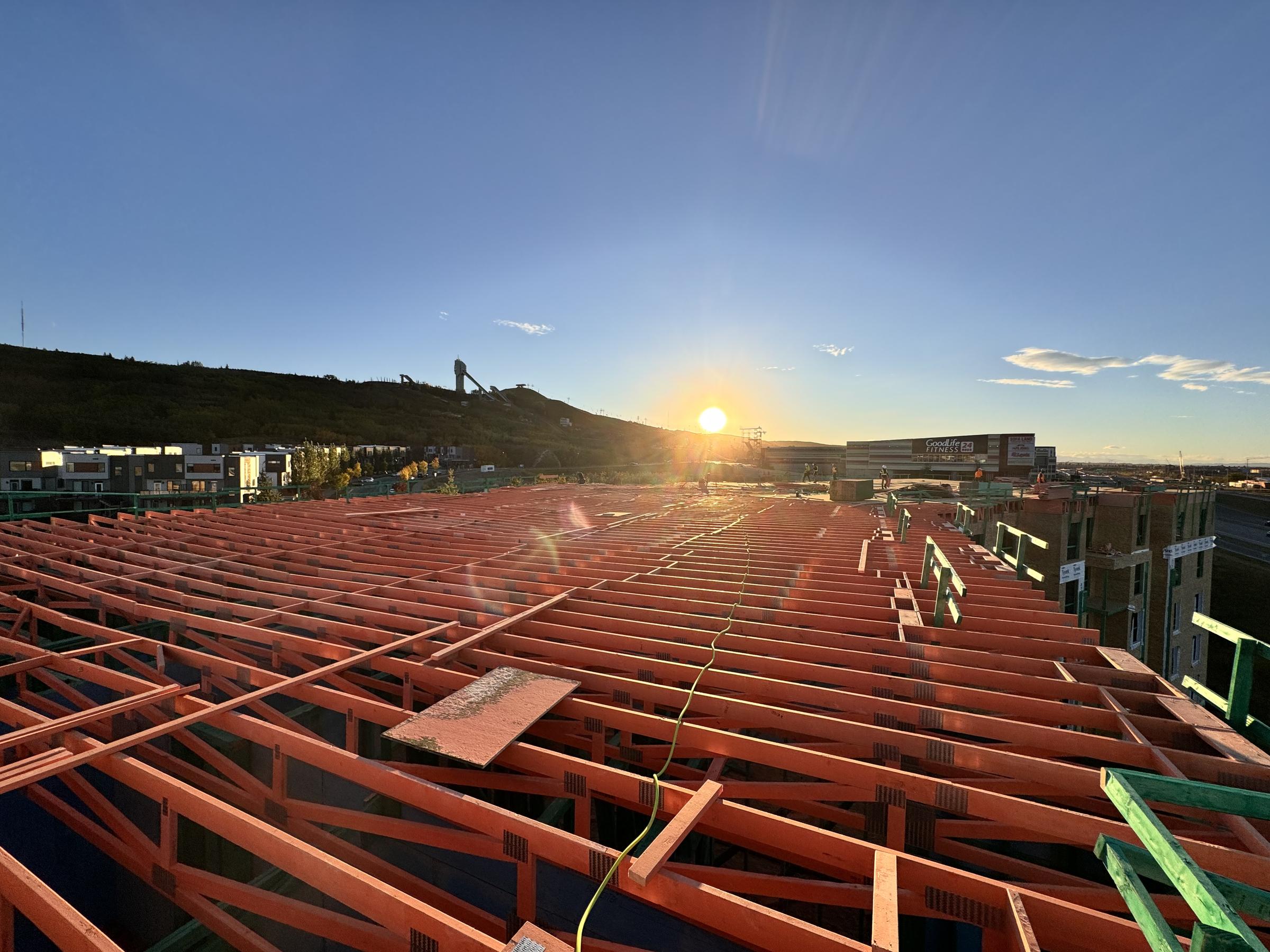 Sunset over a completed open-web floor system